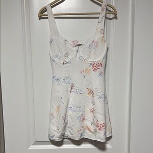 La Hearts Cream Bustier Peplum Mini Dress